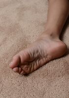 ATK Exotics: Cherry Hilson (Ebony Cherry shows off her feet)