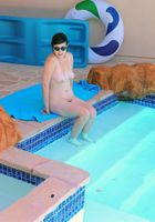 ATK Archives: Dixie Comet (Dixie Comet fingers her pussy.)