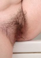 Quinn soaks her big bush in the bathtub, Quinn (qui005) ATK Natural & Hairy: Quinn (Quinn soaks her big bush in the bathtub)
