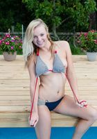 ATK Archives: Sunny (Blonde nudist Sunny gets naked and goes for a swim)